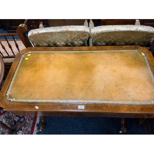 875 - A Victorian walnut and inlaid two drawer leather top library table with nicely carved supports and s... 