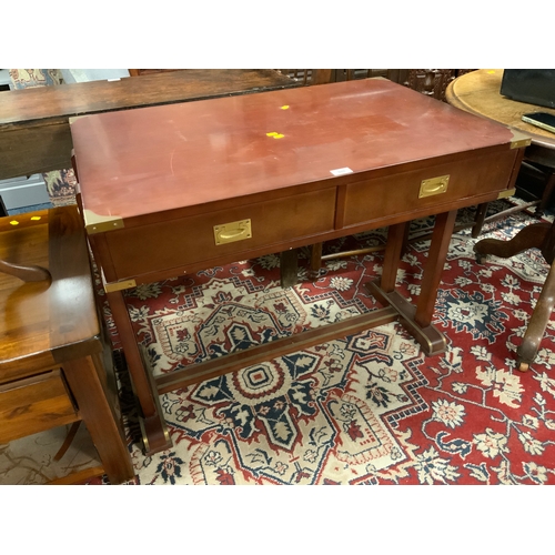 880 - A reproduction mahogany two drawer campaign style desk W 91 cm