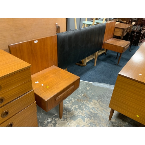 886 - A mid-century teak G plan headboard with two drawers W 252 cm