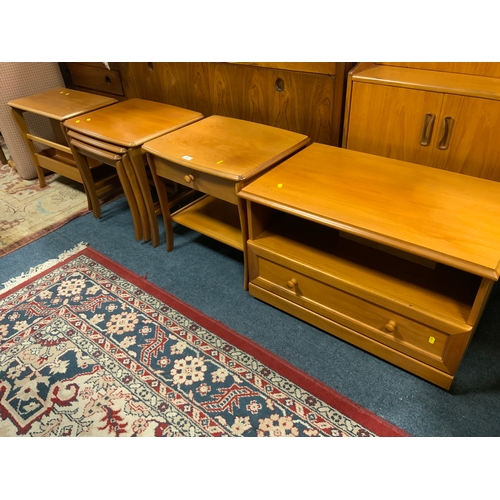 898 - A retro nest of tables together with a TV unit, side table and a magazine rack plus a retro stool