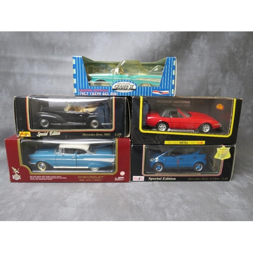 121 - FIVE BOXED 1:18 SCALE DIE CAST CARS, to include Road Legends 1957 Chevrolet Bel Air, Maiston 1997 Me... 