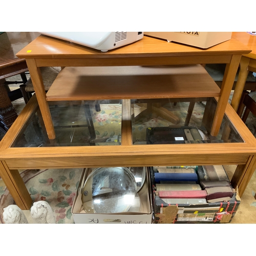 921 - A glass top coffee table together with a smaller teak table