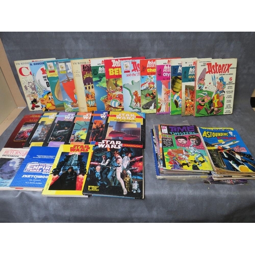 63 - BOX CONTAINING OVER THIRTY MIXED VINTAGE COMICS/MAGAZINES, ten Star Wars books/magazines and fourtee... 