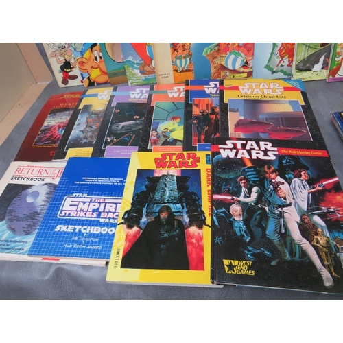 63 - BOX CONTAINING OVER THIRTY MIXED VINTAGE COMICS/MAGAZINES, ten Star Wars books/magazines and fourtee... 