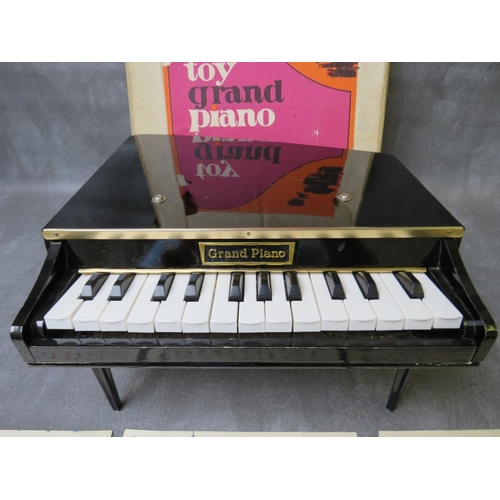 96 - A TOY GRAND PIANO WITH OTIGINAL BOX, in working order at time of consignment