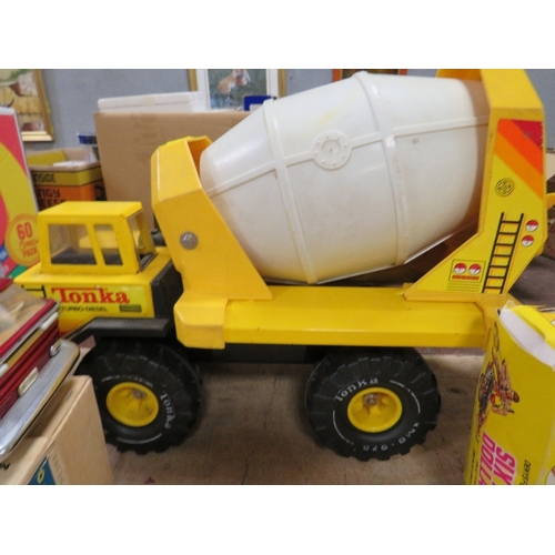 131 - A LARGE TONKA TURBO DIESEL CONCRETE MIXER, a 1960s Chinese made tin plate bus together with a boxed ... 