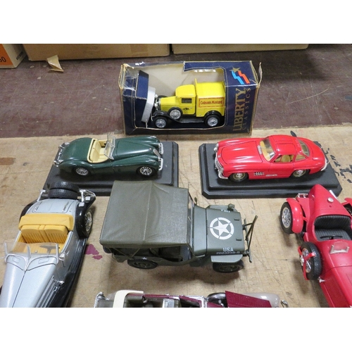 132 - ELEVEN UNBOXED 1:18 SCALE DIE CAST VEHICLES, to include Franklin Mint Duesenburg 1930, Solido Willy ... 