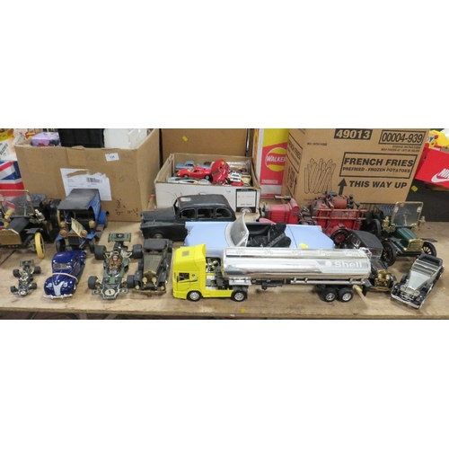 139 - THIRTEEN MAINLY LARGE SCALE UNBOXED VEHICLES, to include tin plate taxi, tin plate fire engine, 2002... 