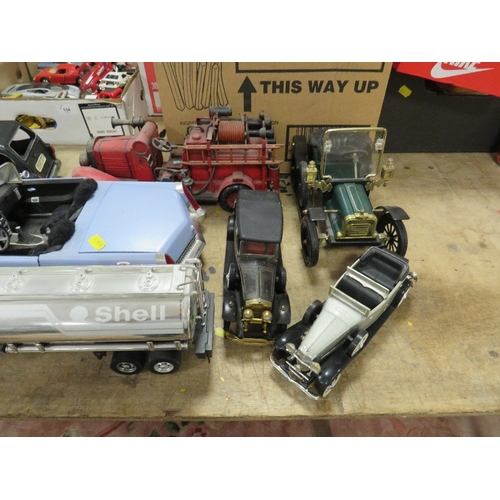 139 - THIRTEEN MAINLY LARGE SCALE UNBOXED VEHICLES, to include tin plate taxi, tin plate fire engine, 2002... 