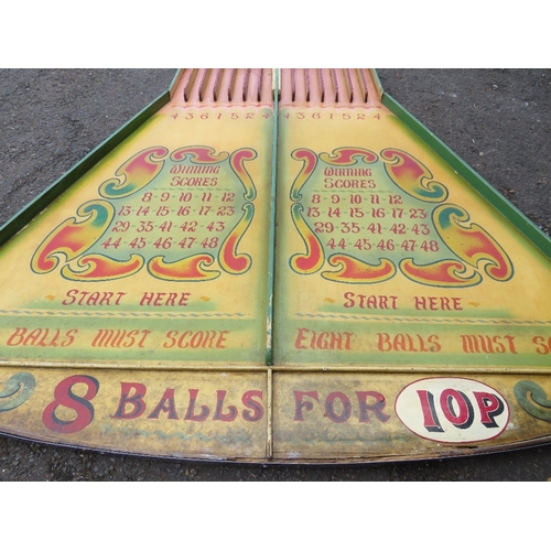 83 - A MID 20TH CENTURY PAINTED WOOD FAIRGROUND ROLL A BALL GAME BOARD, mainly in green and yellow, 145 c... 