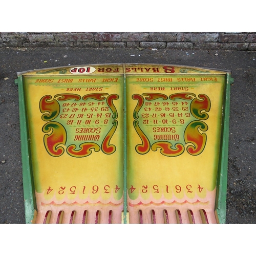 83 - A MID 20TH CENTURY PAINTED WOOD FAIRGROUND ROLL A BALL GAME BOARD, mainly in green and yellow, 145 c... 