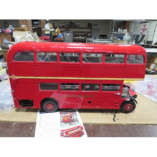 86 - A LARGE DIE CAST 1:12 SCALE HACHETTE BUILD ROUTEMASTER LONDON BUS A/F, with colleciton of various pa... 