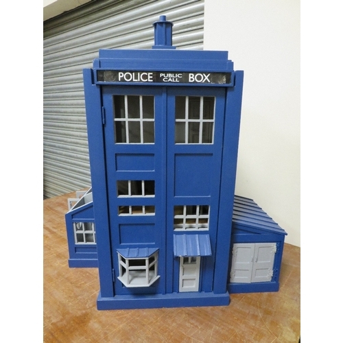 72 - DR WHO INTEREST - A SCRATCH BUILT DOLLS HOUSE IN THE FORM OF THE TARDIS,  with various detachable ou... 