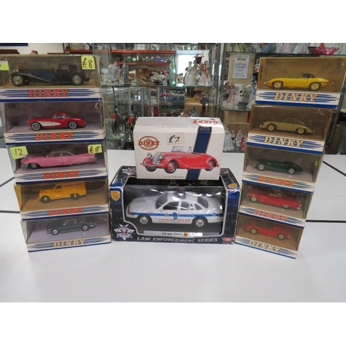 144 - ELEVEN BOXED DINKY CARS AND VANS, to include 1939 Triumph Dolomite, 1959 pink Cadillac etc., togethe... 