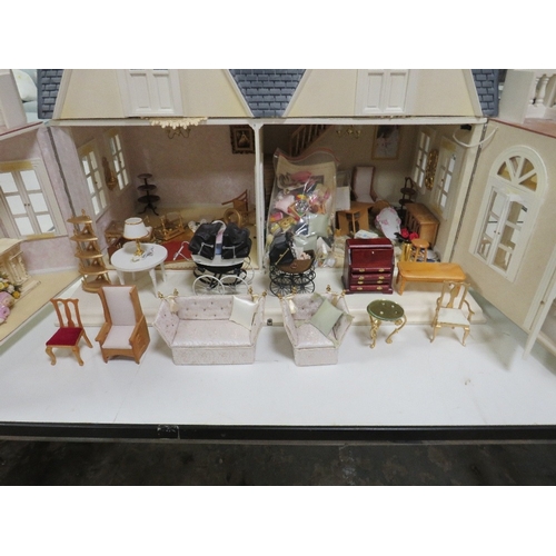 154 - A LARGE MODERN DOLLS HOUSE, approx. W 70 cm, D 44 cm and H 60 cm, together with a large quantity of ... 