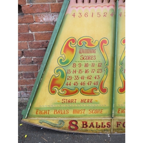 83 - A MID 20TH CENTURY PAINTED WOOD FAIRGROUND ROLL A BALL GAME BOARD, mainly in green and yellow, 145 c... 