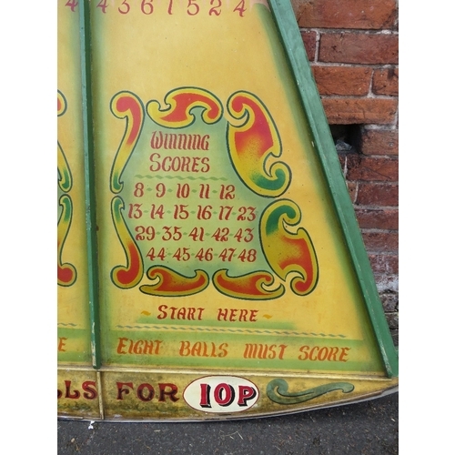 83 - A MID 20TH CENTURY PAINTED WOOD FAIRGROUND ROLL A BALL GAME BOARD, mainly in green and yellow, 145 c... 