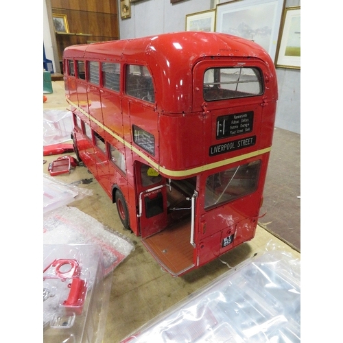 86 - A LARGE DIE CAST 1:12 SCALE HACHETTE BUILD ROUTEMASTER LONDON BUS A/F, with colleciton of various pa... 