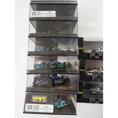 149 - TEN ONYX FORMULA ONE RACING CARS, all 1:43 scale, together with an Onyx Formula One helmet and an On... 