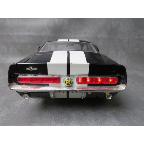 85 - A DE AGOSTINI 1:8 SCALE DIE CAST MODEL OF A FORD MUSTANG 1967 SHELBY GT500, on a mahogany wooden sta... 