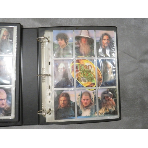 87 - FIVE LORD OF THE RINGS TOPPS TRADING CARD BINDERS AND CONTENTS, together with three Lord of The Ring... 