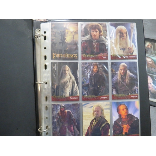 87 - FIVE LORD OF THE RINGS TOPPS TRADING CARD BINDERS AND CONTENTS, together with three Lord of The Ring... 