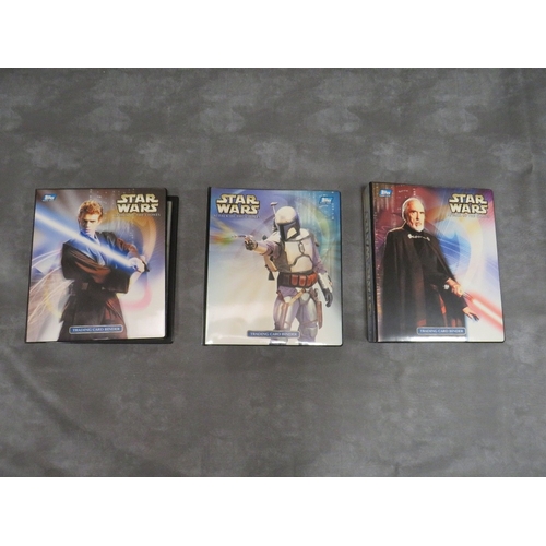 88 - THREE STAR WARS TOPPS TRADING CARD BINDERS AND CONTENTS