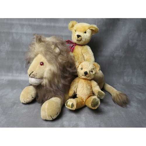 93 - A VINTAGE MERRYTHOUGHT PYJAMA CASE IN THE FORM OF A LION, L 50 cm - not including tail, together wit... 