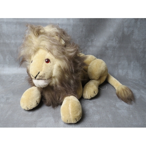 93 - A VINTAGE MERRYTHOUGHT PYJAMA CASE IN THE FORM OF A LION, L 50 cm - not including tail, together wit... 