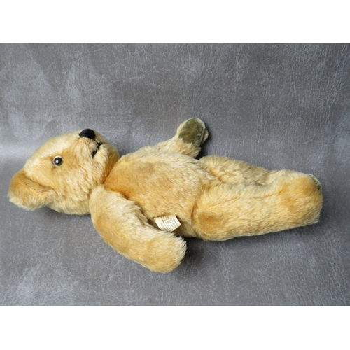 93 - A VINTAGE MERRYTHOUGHT PYJAMA CASE IN THE FORM OF A LION, L 50 cm - not including tail, together wit... 