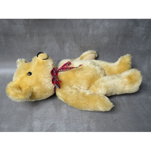 93 - A VINTAGE MERRYTHOUGHT PYJAMA CASE IN THE FORM OF A LION, L 50 cm - not including tail, together wit... 