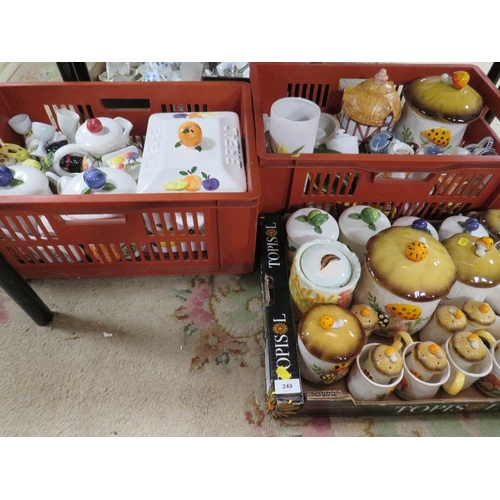 249 - Three trays of kitchen ceramics to include storage jars etc