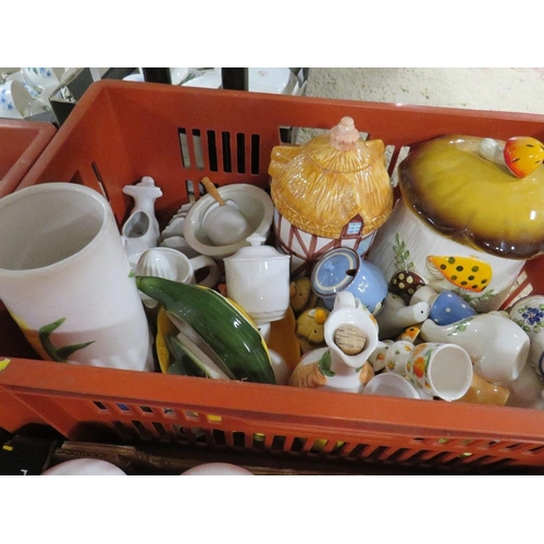 249 - Three trays of kitchen ceramics to include storage jars etc