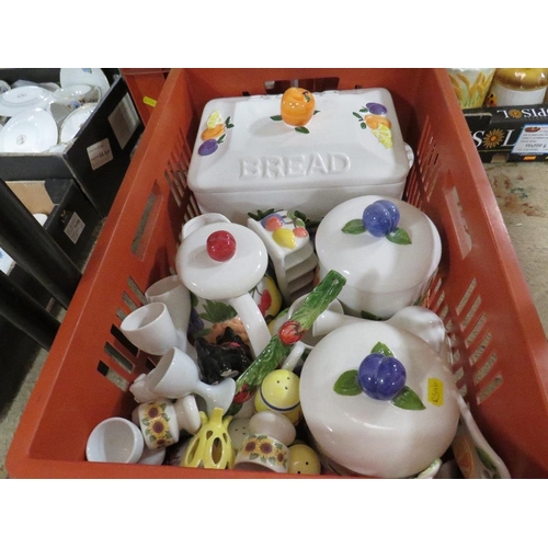 249 - Three trays of kitchen ceramics to include storage jars etc