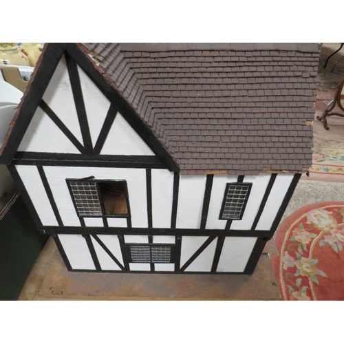 250 - A vintage handmade wooden dolls house