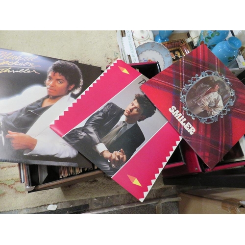 258 - Three cases of LP records to include Paul Young, Michael Jackson etc