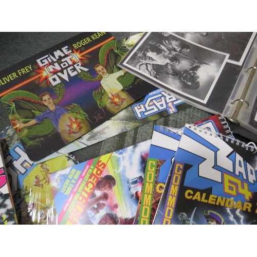 261 - A tray of assorted retro gaming annuals, magazines, books, calendars etc., to include Crash ZX Spect... 