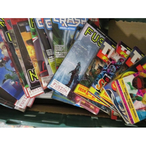 261 - A tray of assorted retro gaming annuals, magazines, books, calendars etc., to include Crash ZX Spect... 