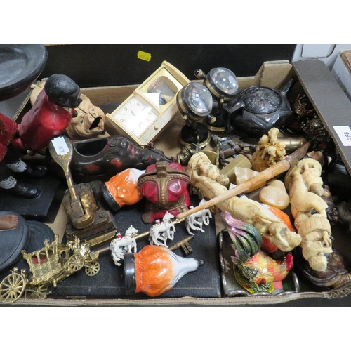 288 - A tray of assorted collectables to include a cast metal novelty pig