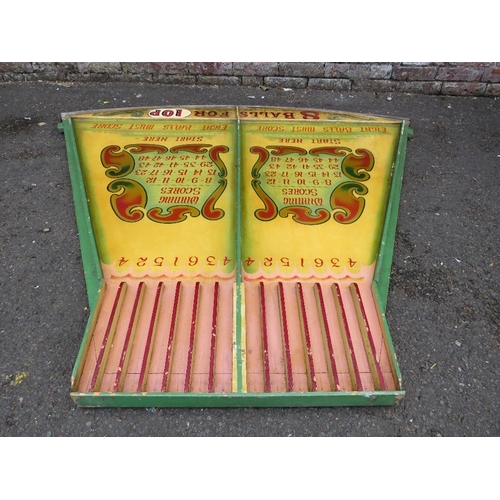 83 - A MID 20TH CENTURY PAINTED WOOD FAIRGROUND ROLL A BALL GAME BOARD, mainly in green and yellow, 145 c... 