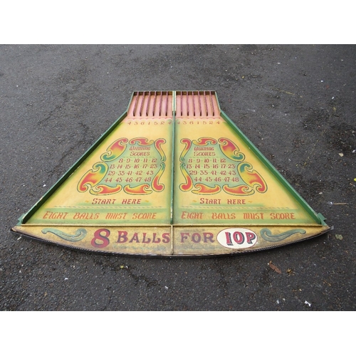 83 - A MID 20TH CENTURY PAINTED WOOD FAIRGROUND ROLL A BALL GAME BOARD, mainly in green and yellow, 145 c... 