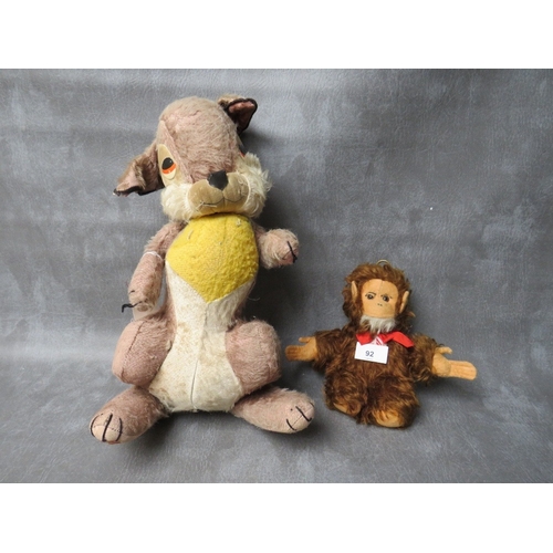 92 - A VINTAGE MERRYTHOUGHT MUSICAL 'THUMPER' SOFT TOY, H 41 cm, together with a musical Music Reuge bear... 