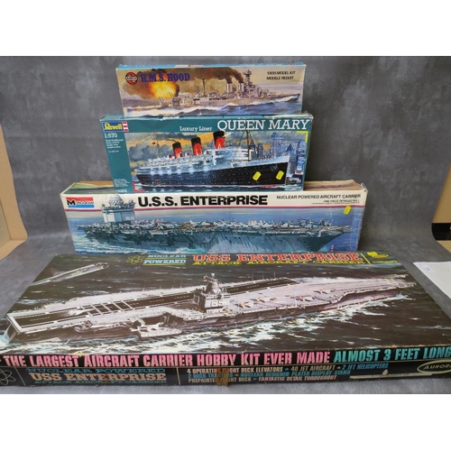 107 - FOUR SHIPS MODEL KITS, to include Aurora USS Enterprise aircraft carrier with instructions and trans... 