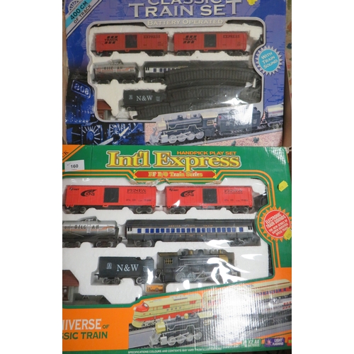 160 - TWO LARGE BOXED BATTERY OPERATED TRAINSETS, to include Universe of Classic Train International Expre... 