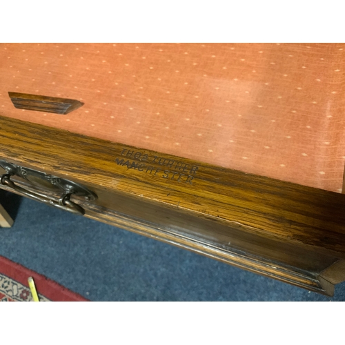 713 - A large Edwardian carved oak display cabinet - stamped ‘Thos Turner Manchester’ to the drawer H 244 ... 