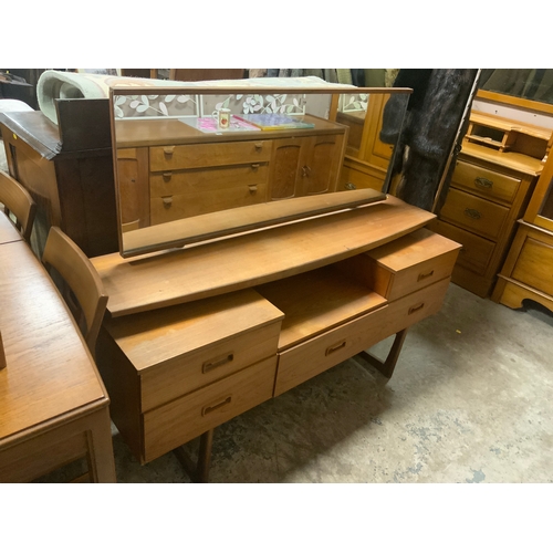 738 - A mid-century teak dressing table