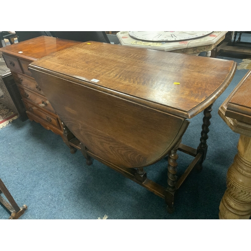 742 - An oak barley twist drop leaf table