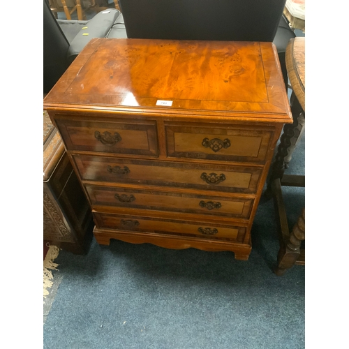 743 - A small reproduction five drawer chest