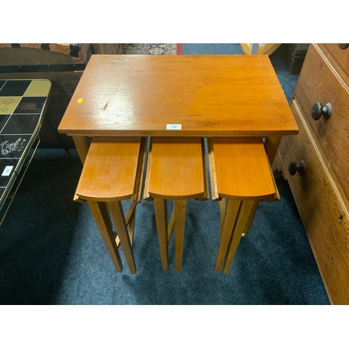 750 - A mid-century teak nest of four tables