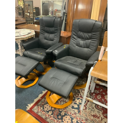 762 - A pair of modern black massage chairs A/F with missing cables